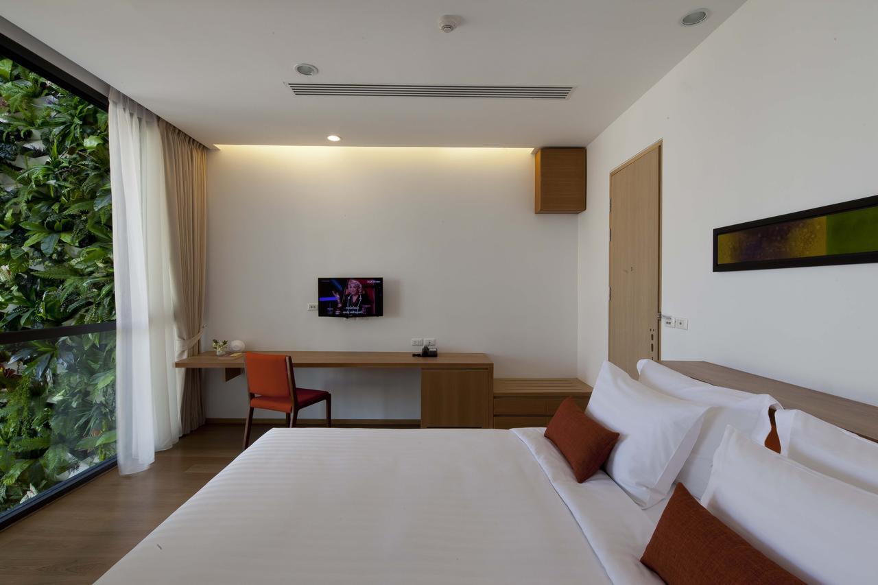 Eastin Tan Hotel Chiang Mai - SHA Plus Certify Ruang foto